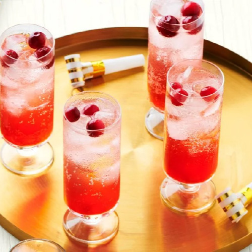 platter of four glasses of cranberry sparkler mocktails